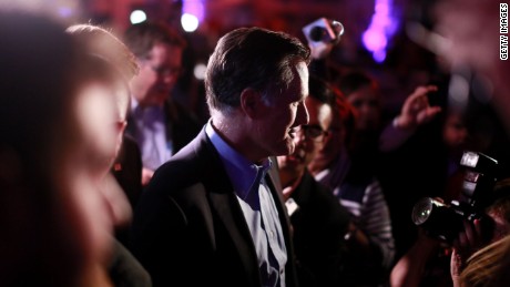 SAN DIEGO, CA - JANUARY 16: Mitt Romney is greeted by fellow Republicans at a dinner during the Republican National Committee&#39;s Annual Winter Meeting aboard the USS Midway on January 16, 2015 in San Diego, California. Romney is contemplating a possible 2016 presidential run. 