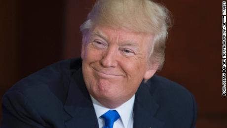 WASHINGTON, DC - JUNE 09: US President Donald Trump (R) participates in the &#39;Roads, Rails, and Regulatory Relief roundtable meeting&#39;, at the Department of Transportation on June 9, 2017 in Washington, DC.  (Photo by Michael Reynolds-Pool/Getty Images)