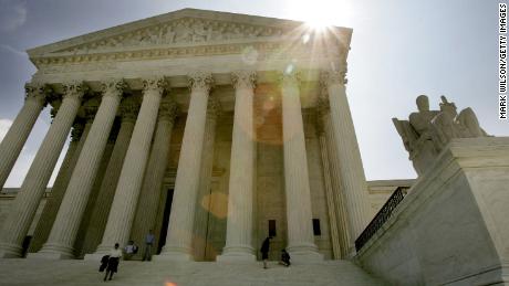 WASHINGTON - JUNE 13: The sun rises over the U.S. Supreme Court June 13, 2005 in Washington DC. The court refused to hear the case of terror suspect Jose Padilla today as well as overturning the conviction of Thomas Miller-El, a black death row inmate, ruling that Texas prosecutors unfairly stacked his jury with whites. (Photo by Mark Wilson/Getty Images)