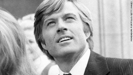 American actor and director Robert Redford sitting beside American actress and director Karen Carlson in the film The candidate. USA, 1972. (Photo by Mondadori via Getty Images)