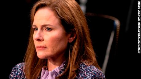 Supreme Court justice nominee Amy Coney Barrett, listens during her confirmation for Supreme Court on the third day before the Senate Judiciary Committee on Capitol Hill on October 14, 2020 in Washington, DC. - After liberal icon Ruth Bader Ginsburg&#39;s death last month left the nine-member court with a vacancy, Trump has rushed to fill it at the height of his presidential election battle against Democrat Joe Biden. (Photo by Stefani Reynolds / various sources / AFP) (Photo by STEFANI REYNOLDS/AFP via Getty Images)