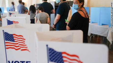 ATLANTA, GA - JUNE 09: People wait in line to vote in Georgia&#39;s Primary Election on June 9, 2020 in Atlanta, Georgia. Voters in Georgia, West Virginia, South Carolina, North Dakota, and Nevada are holding primaries amid the coronavirus pandemic. (Photo by  Elijah Nouvelage/Getty Images)