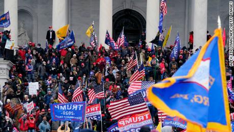 TOPSHOT - Supporters of US President Donald Trump protest outside the US Capitol on January 6, 2021, in Washington, DC. - Demonstrators breeched security and entered the Capitol as Congress debated the a 2020 presidential election Electoral Vote Certification. (Photo by ALEX EDELMAN / AFP) (Photo by ALEX EDELMAN/AFP via Getty Images)