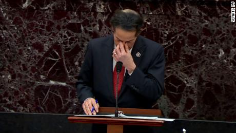 Rep. Jamie Raskin wipes his eyes while sharing a personal story on the Senate floor reflecting on the events of January 6.