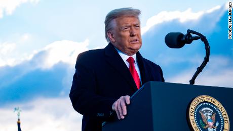 JOINT BASE ANDREWS, MARYLAND - JANUARY 20: President Donald Trump speaks to supporters at Joint Base Andrews before boarding Air Force One for his last time as President on January 20, 2021 in Joint Base Andrews, Maryland. Trump, the first president in more than 150 years to refuse to attend his successor&#39;s inauguration, is expected to spend the final minutes of his presidency at his Mar-a-Lago estate in Florida. (Photo by Pete Marovich - Pool/Getty Images)