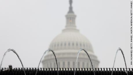 WASHINGTON, DC - FEBRUARY 13:  Razor wire is shown atop a fence outside the U.S. Capitol during the fifth day of former President Donald Trump&#39;s impeachment trial February 13, 2021 in Washington, DC. The Senate is expected to conclude their deliberations and vote later today. (Photo by Win McNamee/Getty Images)