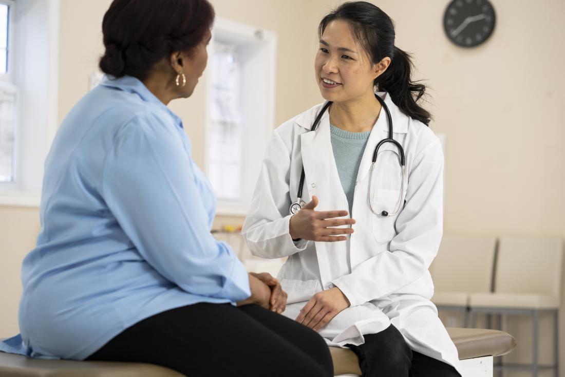 Doctor explaining kidney function tests to patient.