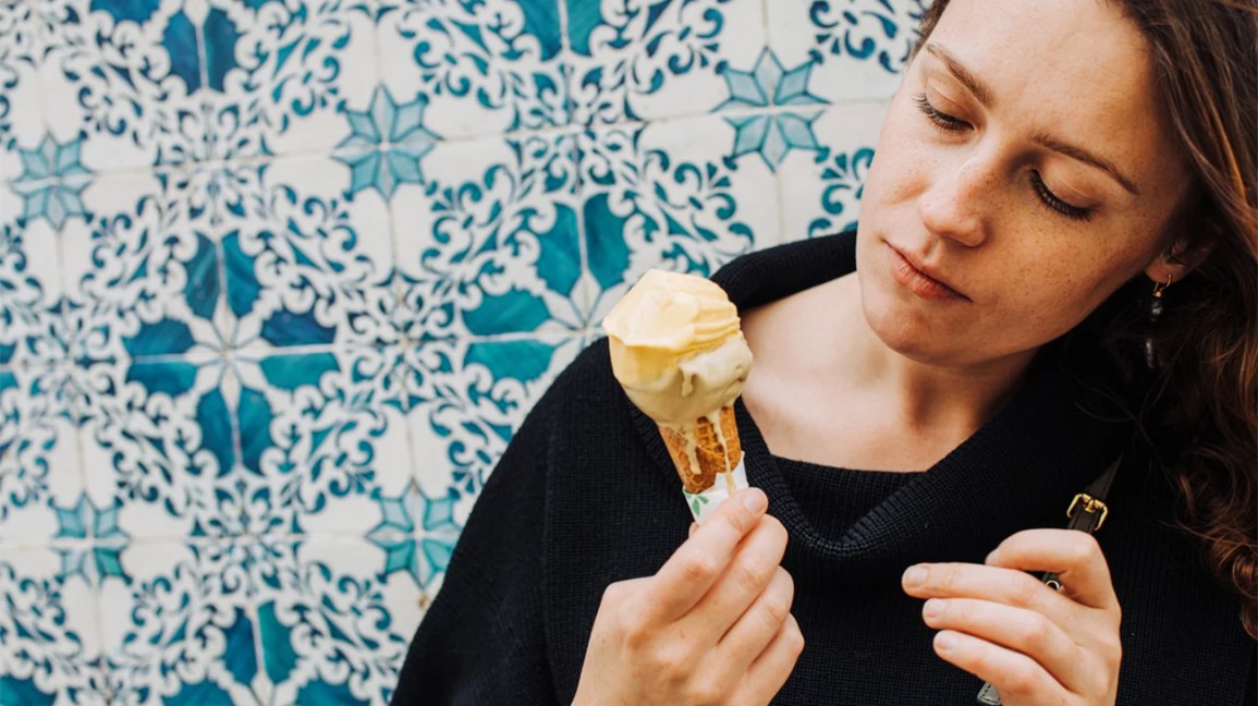 woman holding ice cream cone