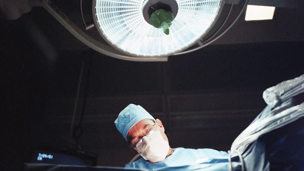 A low angle view of surgeon in an operating theater