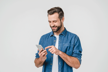 Man viewing pictures on his cell phone that he took of his skin.