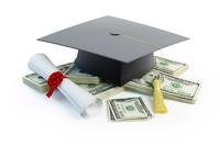 Pile of money with mortarboard on top