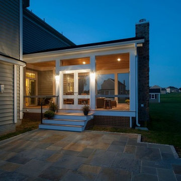 Elevated Screened Porch and Patio with Outdoor Fireplace in Sykesville, MD