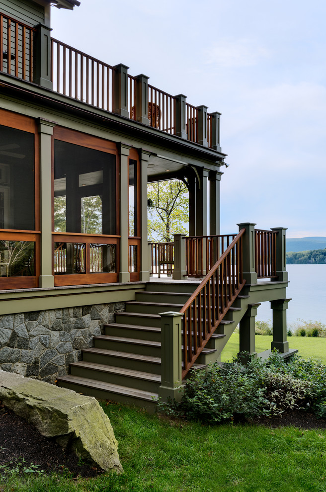 This is an example of a traditional porch design in New York with a roof extension.