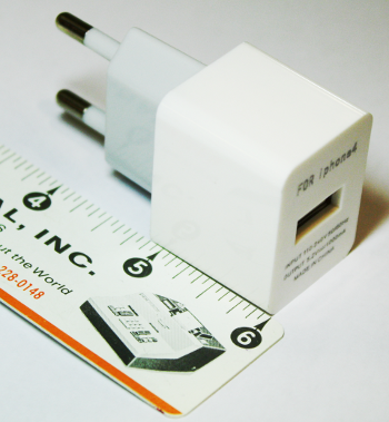 A one-inch USB charger designed for the iphone4