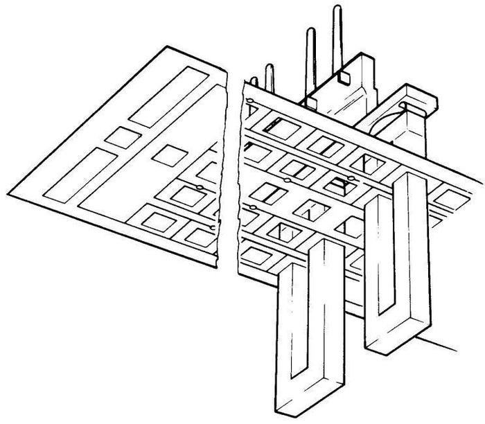 Structure of the transformers, viewed from underneath. Each transformer consists of a U-piece that goes through the tapes, and an I-bar that completes the transformer. From Model 40 Functional Units.