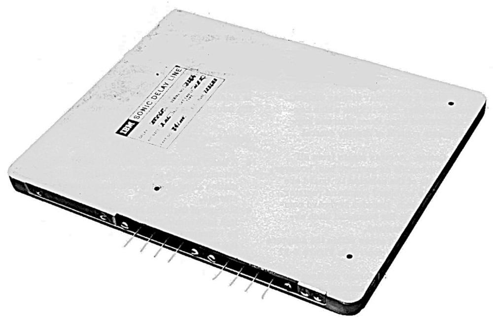 Sonic delay line module from the IBM 2260 display. This module contained about 50 feet of coiled nickel wire. Image from 2260 Field Engineering Theory of Operation Manual.