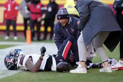 Tank Dell injury update: The Texans WR has suffered a dislocated knee cap and could require surgery