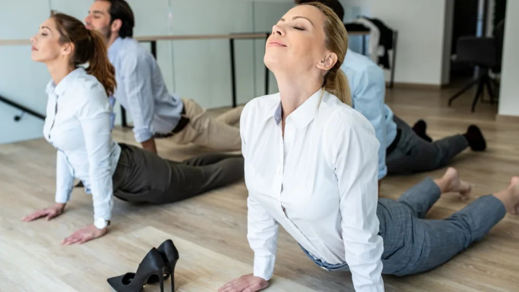 Colleagues Doing Exercise in the Workplace