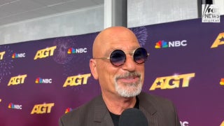 ‘AGT’ judge Howie Mandel reacts to Heidi Klum jumping onto his lap during shocking act - Fox News