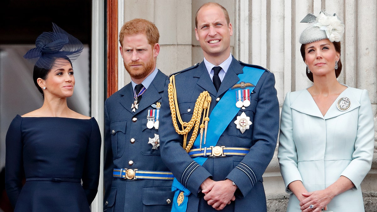 Meghan Markle, Prince Harry, Prince William and Kate Middleton wearing formal wear on the buckingham palace balcony