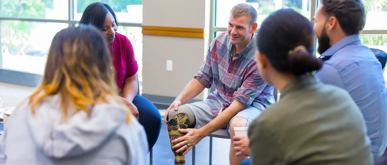 A group of employees gathered in a circle.