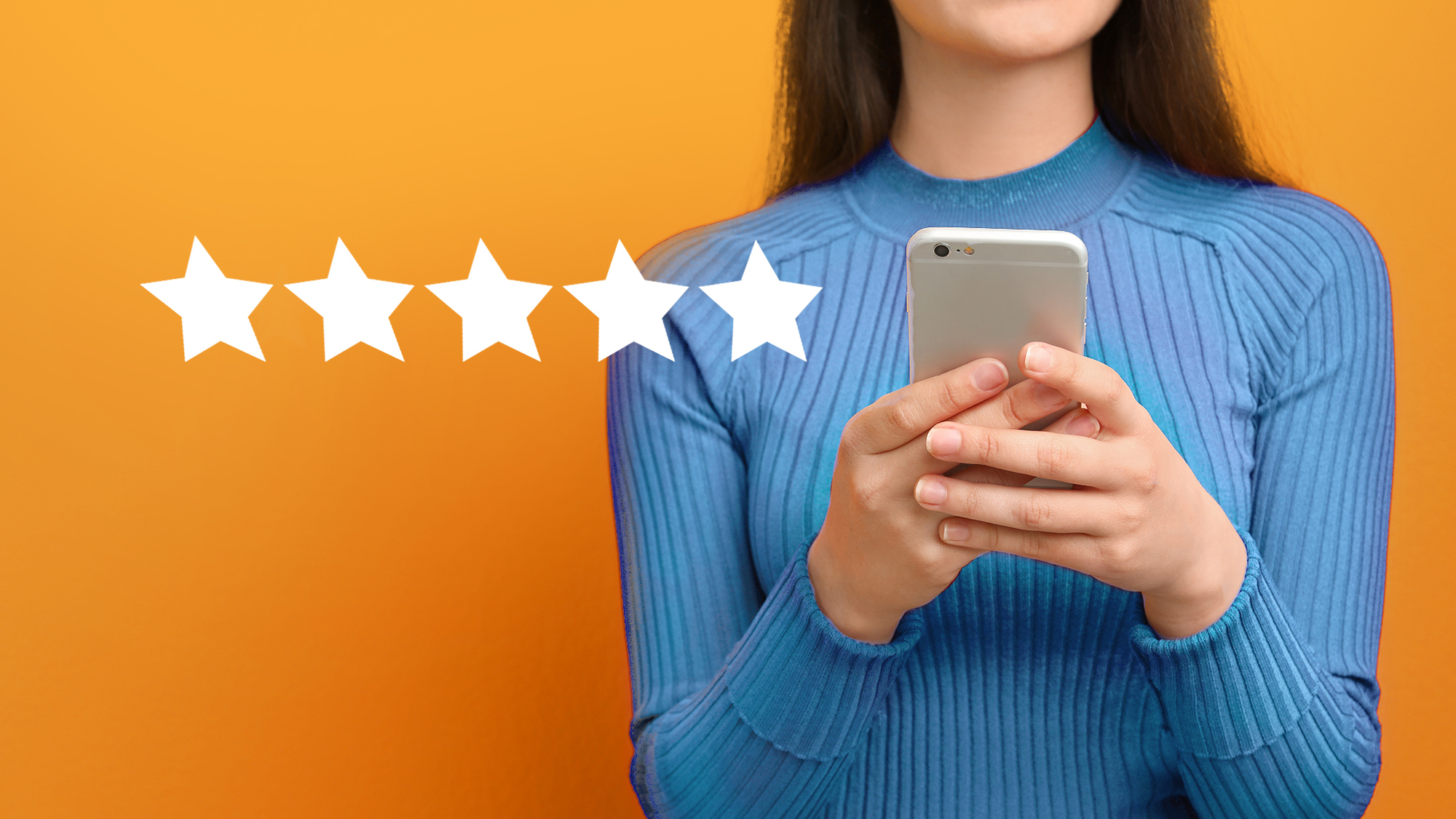 A woman holds up a smartphone to look at it. There are five stars to the left of the woman.