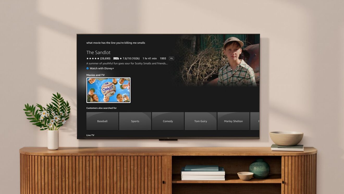 An image of a Fire TV in a living room showing Fire TV’s AI-enhanced search.