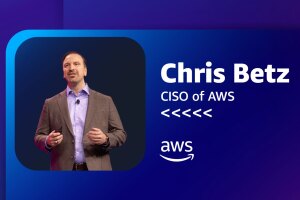 A photo of Chris Betz, CISO of AWS, speaking on stage.