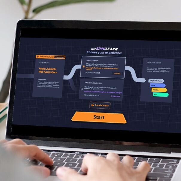 Hands typing on laptop keyboard displaying SimuLearn