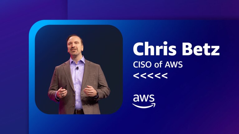 A photo of Chris Betz, CISO of AWS, speaking on stage.