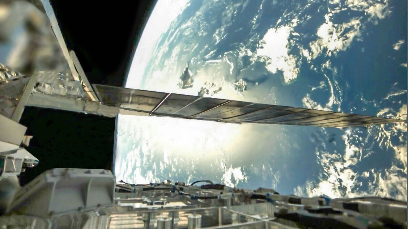 An image of a satellite from space showing the earth. 