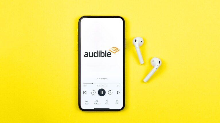 Amazon Audible app open on mobile with play controls