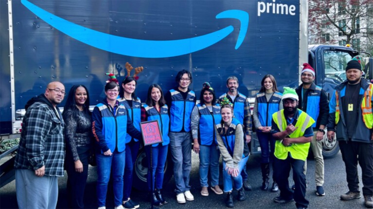 A photo of Amazon volunteers donating items to Mary's Place Family Shelters.