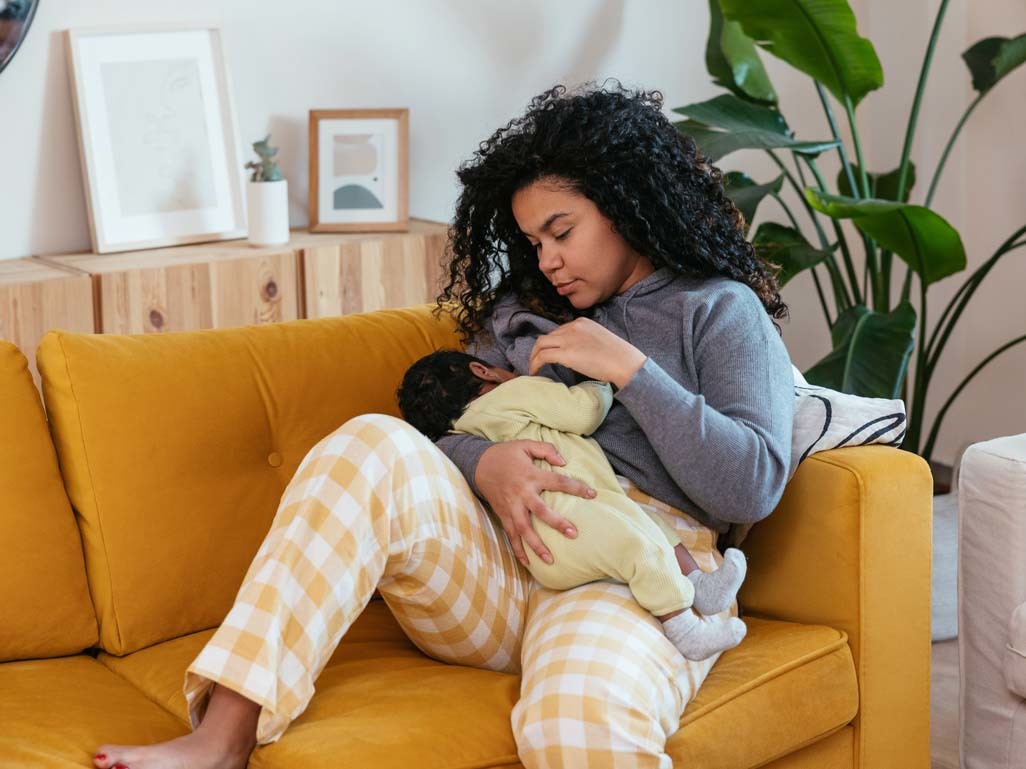 Woman breastfeeding a baby