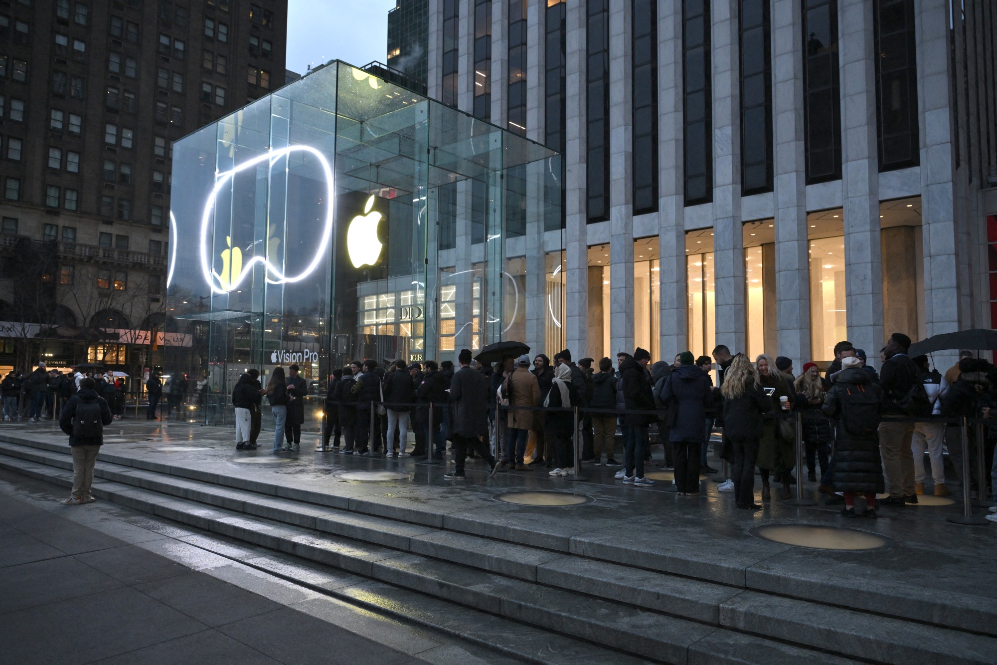 People line up outside the New York Apple Store as the Vision Pro headset is released on Feb. 2.