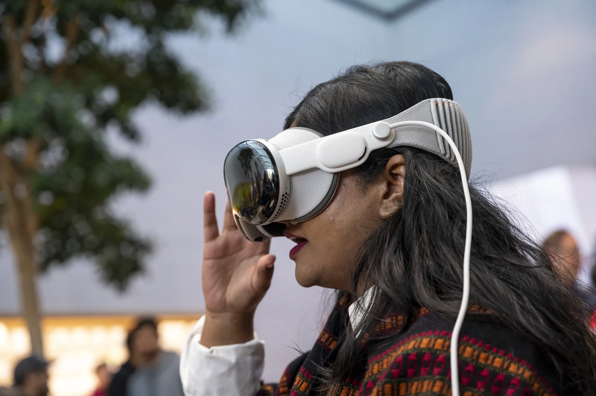 A customer tries out the Vision Pro at a store in Palo Alto, California.