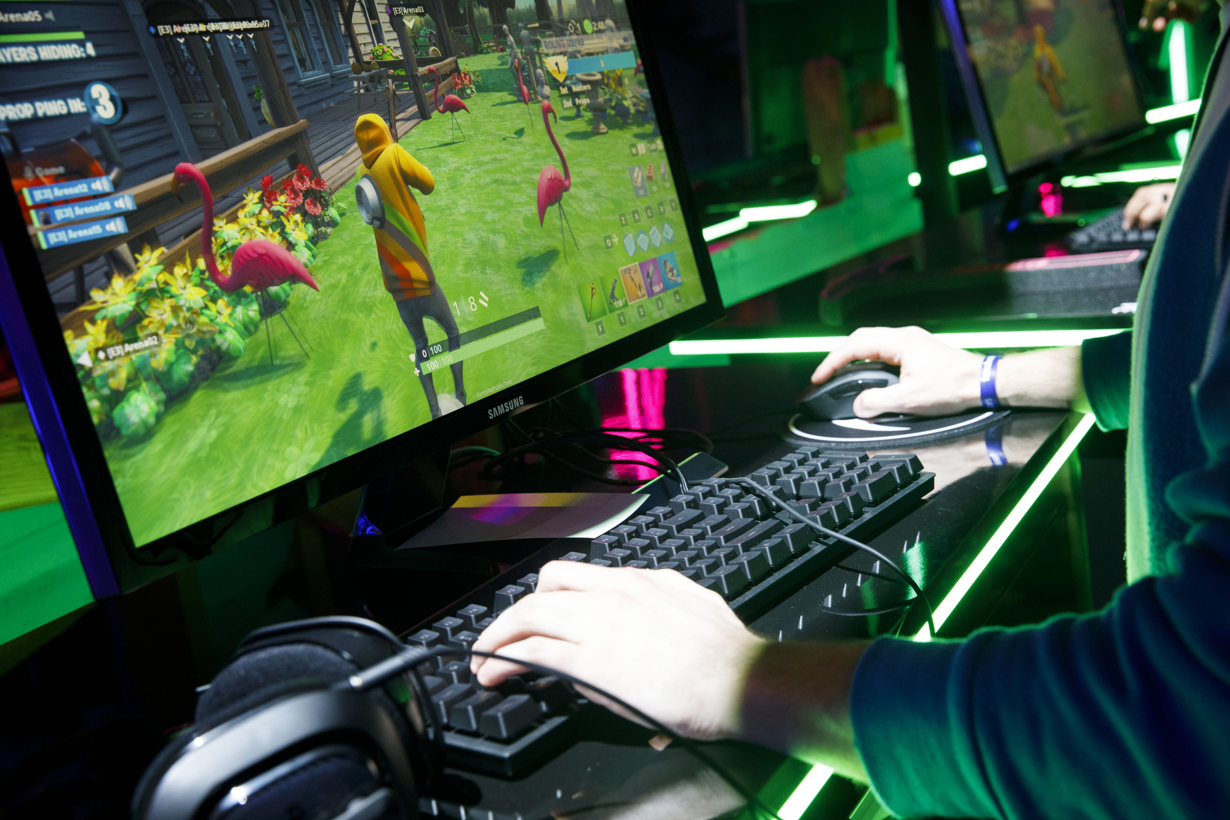 An attendee plays the Epic Games Inc. Fortnite video game during the E3 Electronic Entertainment Expo in Los Angeles, California.