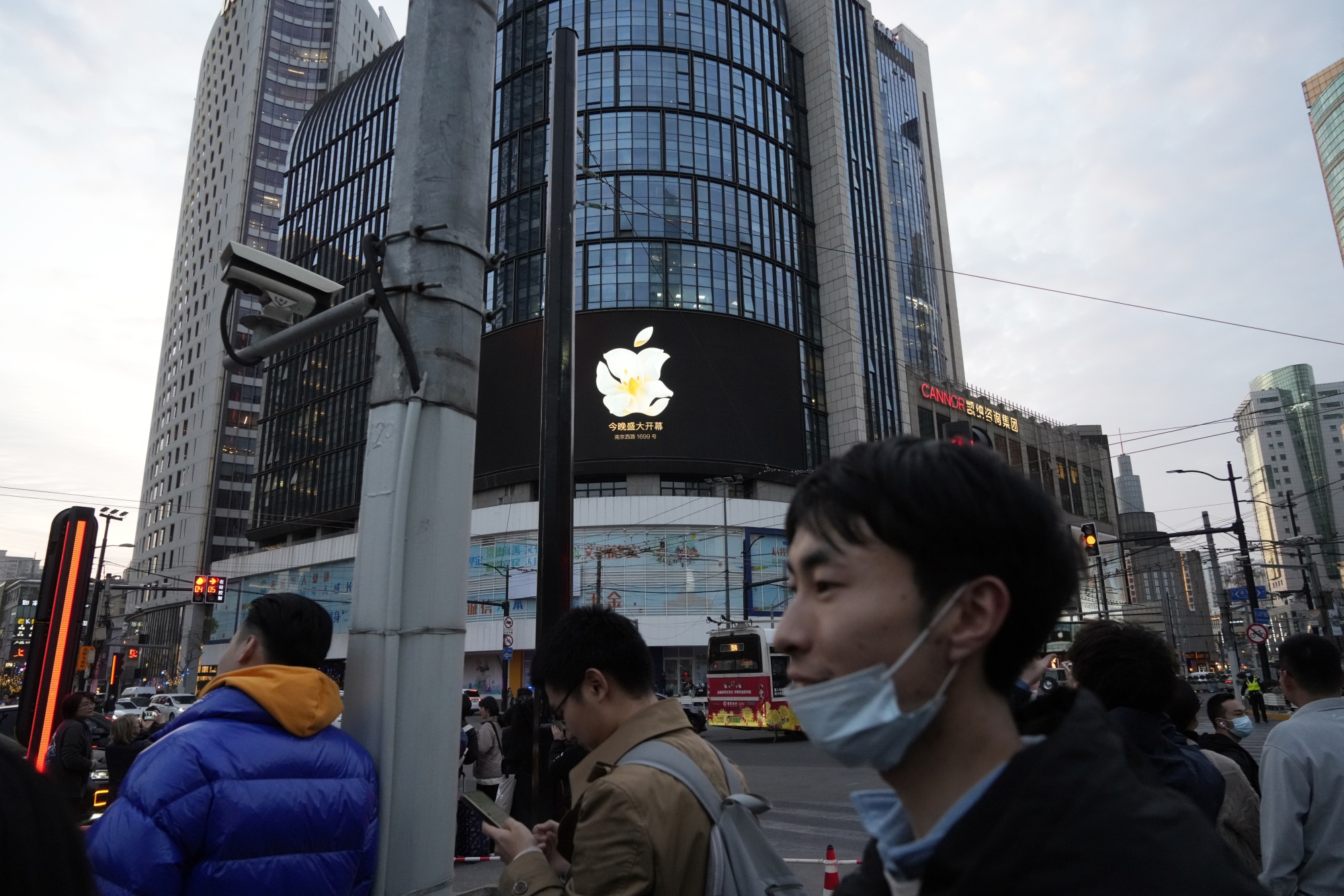 An ad for the opening of an Apple store in Shanghai.