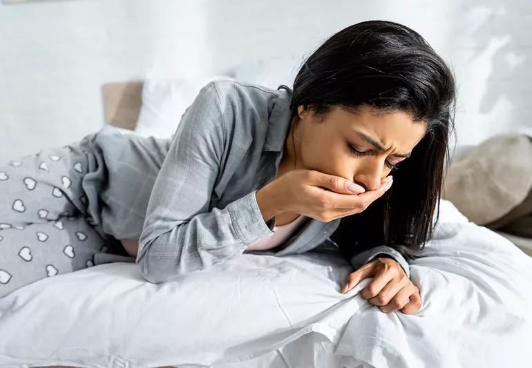 woman sick in morning