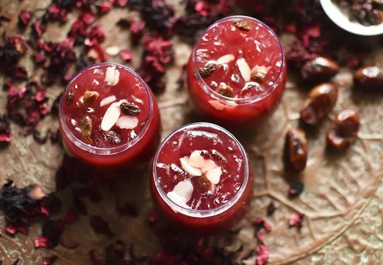 A birds-eye-view of three glasses of iced herbal tea