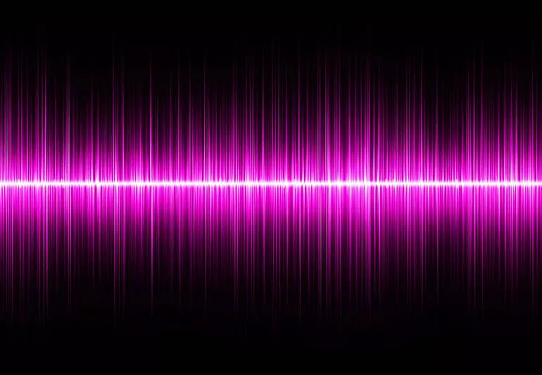 Pink soundwaves, showing high and low noise frequencies.