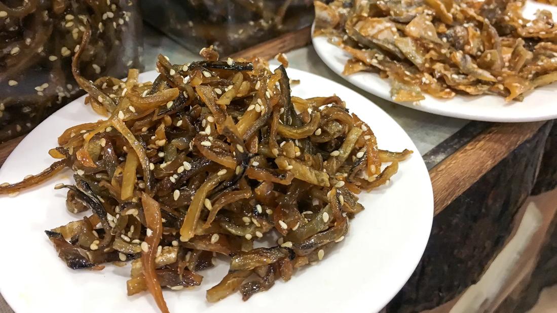 Plate of fresh kelp with seasame seeds