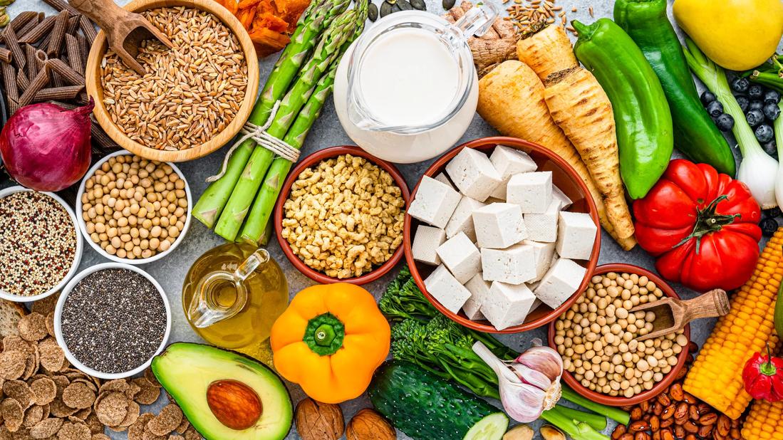 An array of meatless foods in different vessels on table