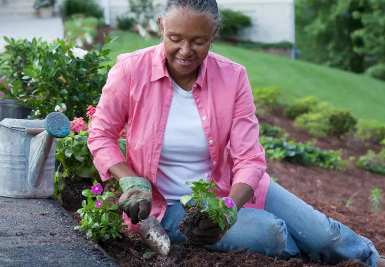 woman planting flowers