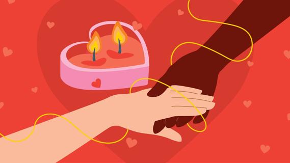 Two hands holding each other, attached by an invisible string, next to a twin flame heart-shaped candle