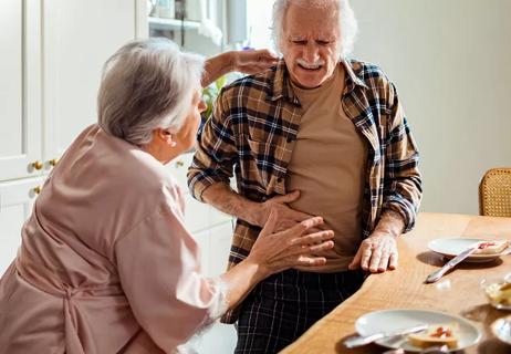 man sick after eating breakfast