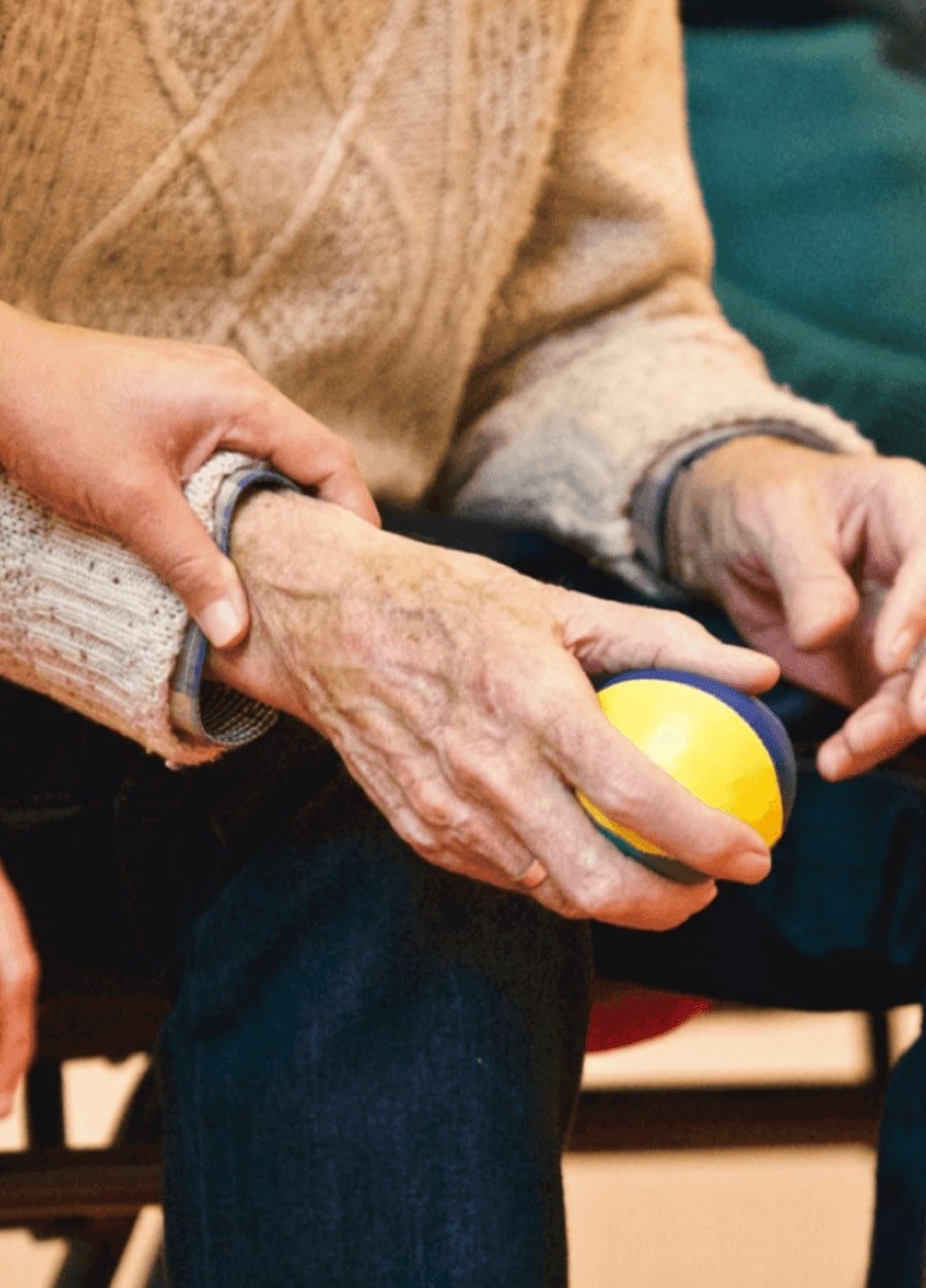 Elderly man's pulse being taken.