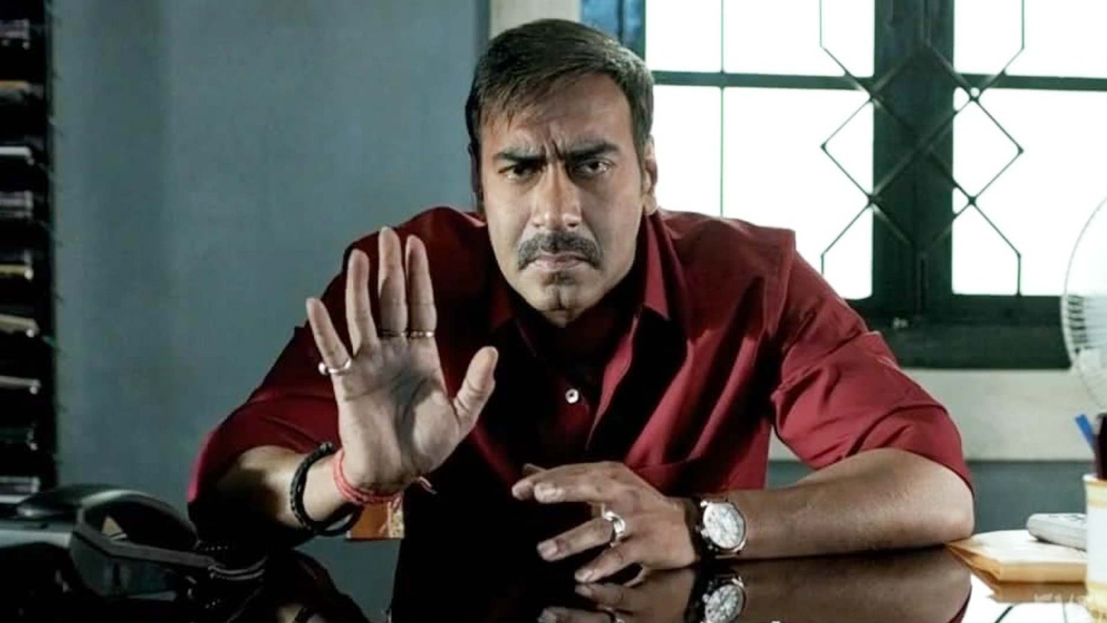 Image may contain Ajay Devgan Head Person Face Adult Wristwatch Angry and Sad