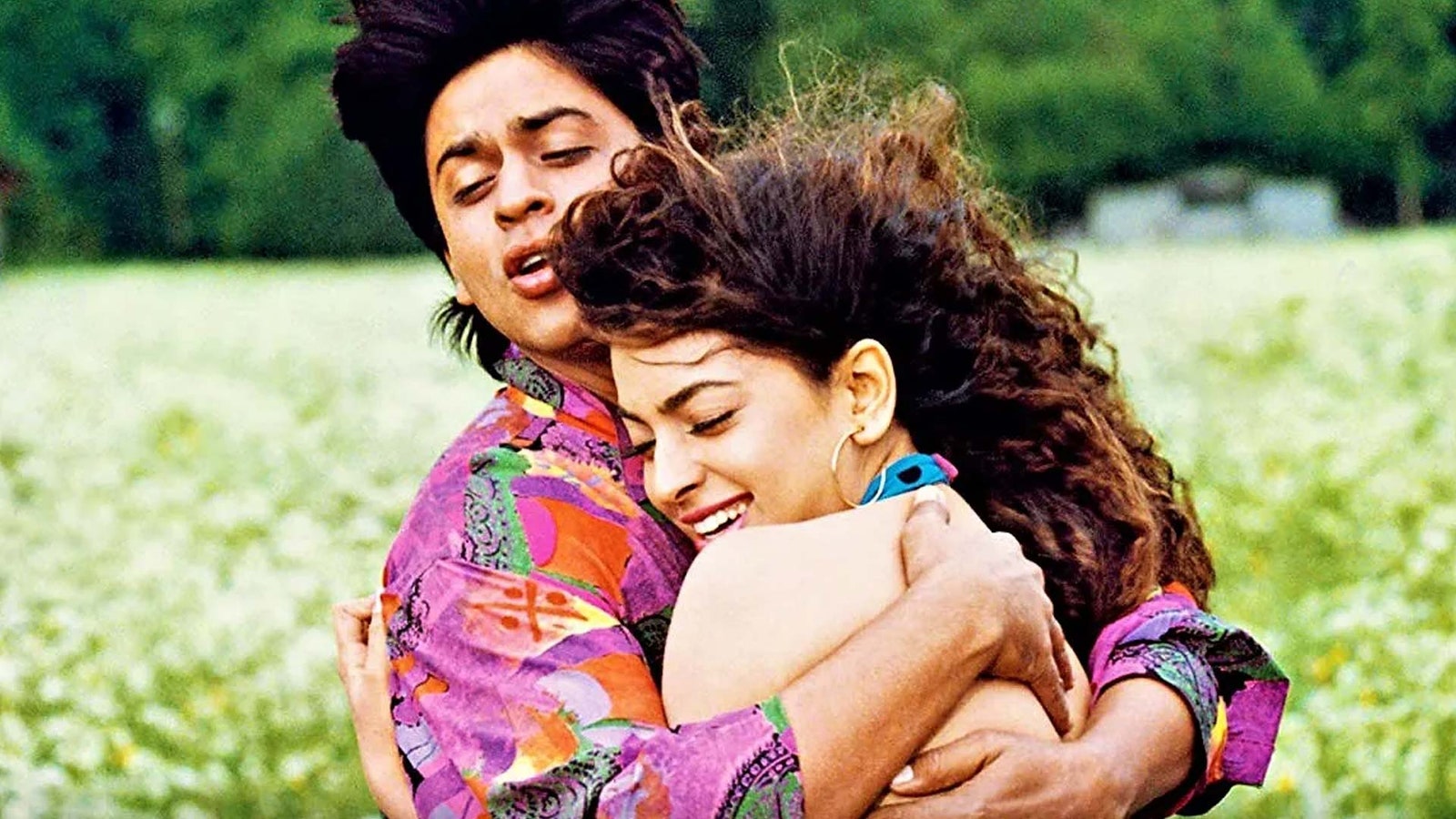 Image may contain Juhi Chawla Adult Person Hugging Head and Face