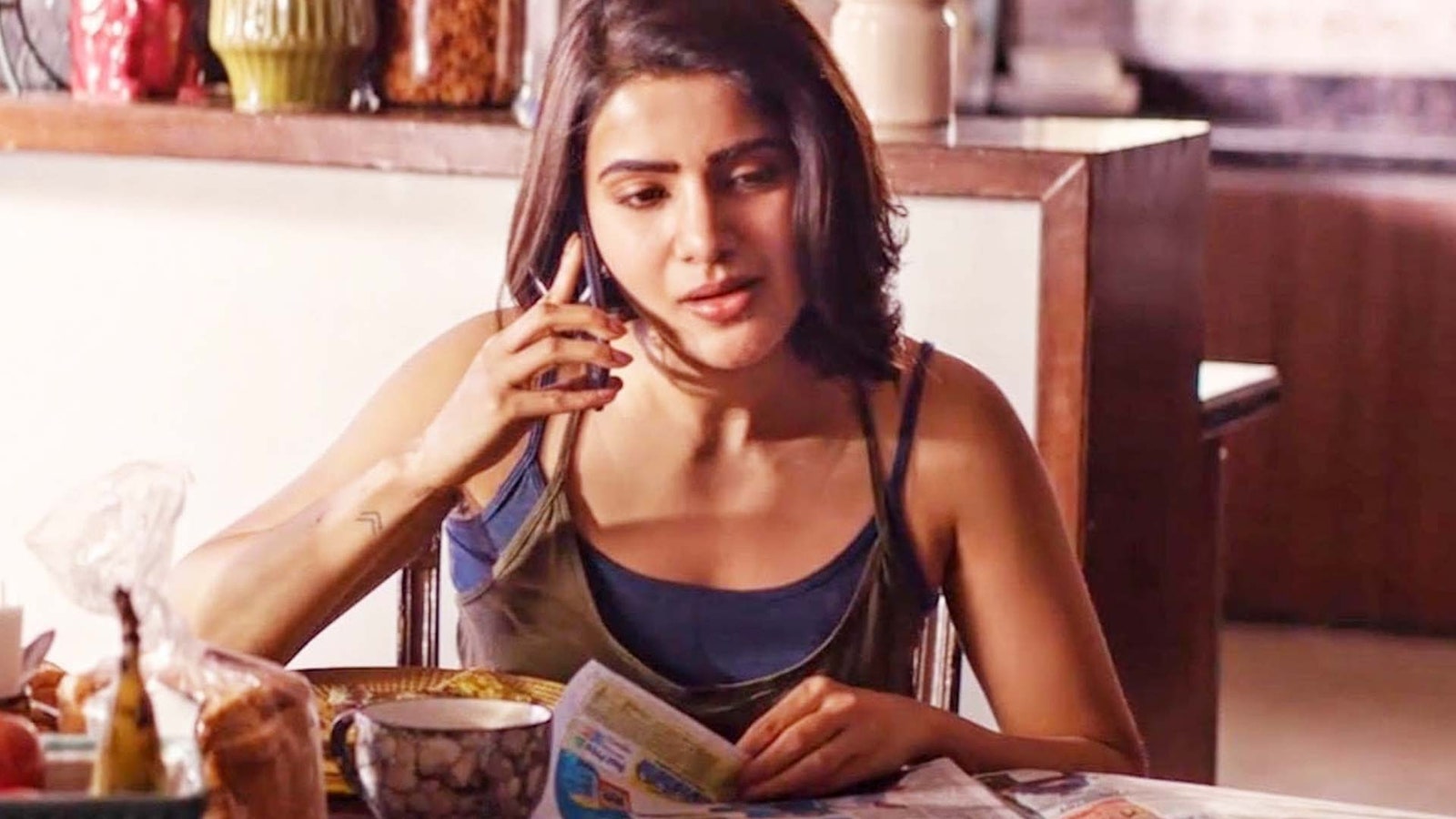 Image may contain Samantha Akkineni Face Head Person Cup Adult and Sad